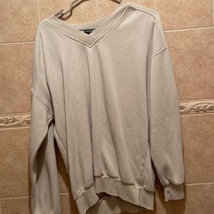 Just a normal v neck sweater , size S. It has a interesting color